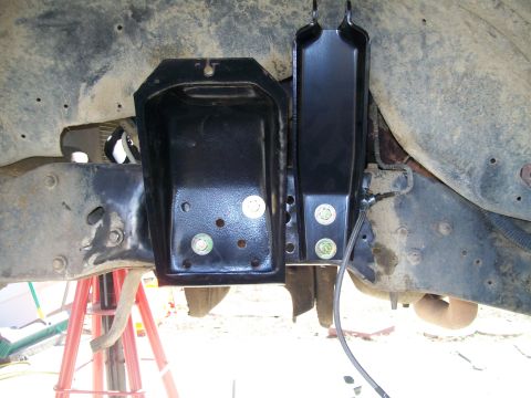 1991 Ford Bronco - This photo shows aftermarket suspension components being installed on a vehicle's frame.