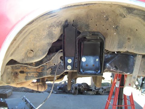 1991 Ford Bronco - Frame modification in progress on a Ford Bronco, showing new suspension mounts.