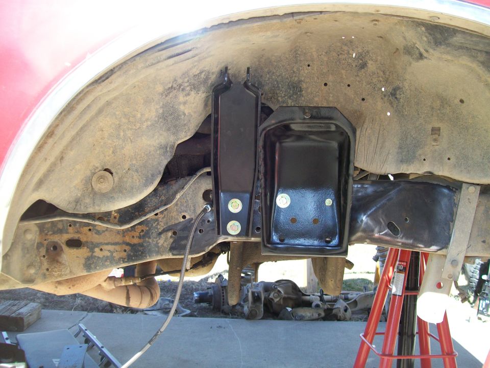 Close-up of modified frame and suspension components on a Ford Bronco