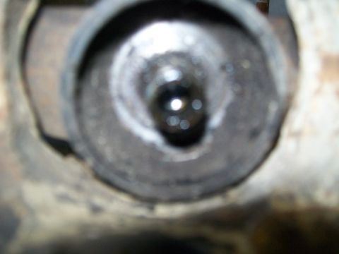 1991 Ford Bronco - A close-up view of a metal component, possibly part of an engine or exhaust system.
