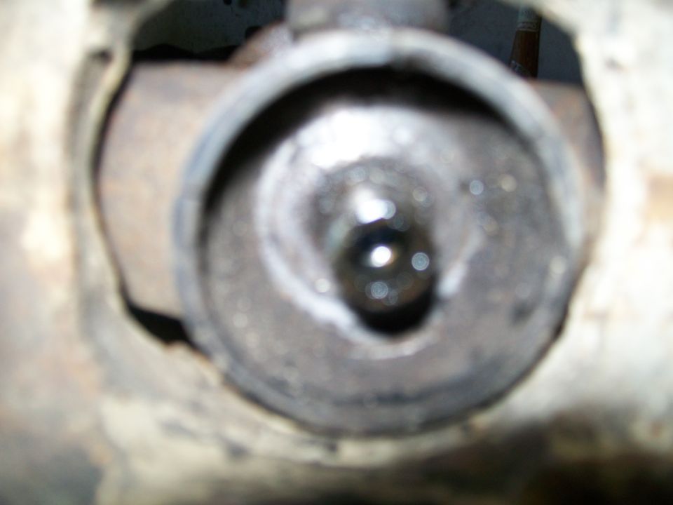 Close-up of a circular metal component with a central opening