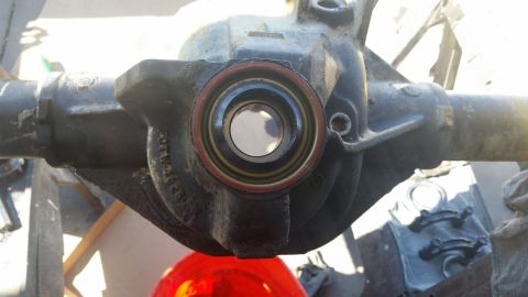 1992 Ford Bronco - Close-up of a vehicle's differential housing, showing internal components and seals.
