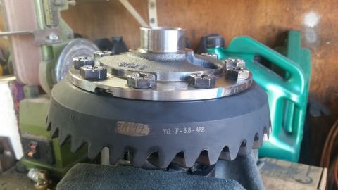 1992 Ford Bronco - A differential gear set is shown with visible teeth and bolts, marked with part numbers.