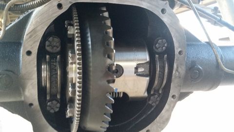 1992 Ford Bronco - Close-up view of differential gears, showing internal components and some stamped text.