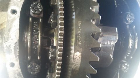 1992 Ford Bronco - Close-up of differential gears, one marked YG-F-8.8-488, with a handwritten '1999'.