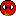 1988 Ford Bronco - A close-up of a red cartoon character with white eyes against a dark background.