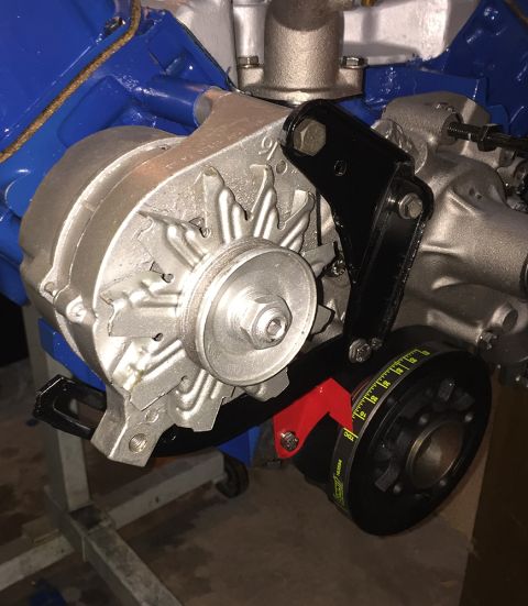 1978 Ford Bronco - Engine components including an alternator and a crankshaft pulley with timing marks are shown in this close-up view.