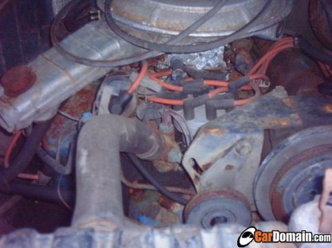 1978 Ford Bronco - Close-up view of an engine bay, showing various components and wiring.
