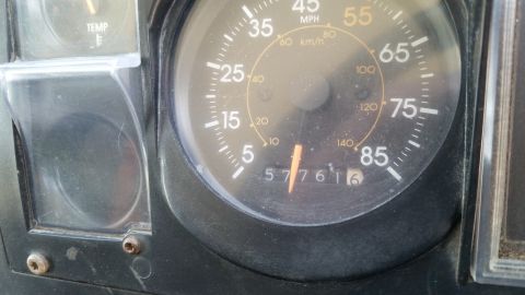 1991 Ford LTD Crown Victoria - The dashboard displays the odometer reading of 57761 miles and a temperature gauge.