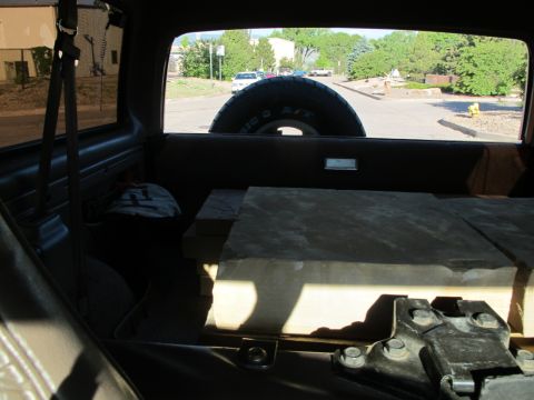 1996 Ford Bronco - View from inside a 1996 Ford Bronco, looking towards the rear cargo area and out the back window.