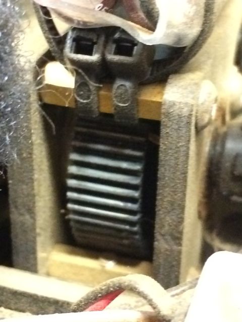 1989 Ford Bronco - A close-up view of a geared mechanism, likely part of a larger assembly, with visible wires and connectors.