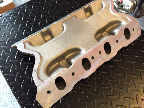 1972 Ford Ranchero - Aluminum intake manifold shown on a diamond plate surface. The registry claims it is from a 1972 Ford Ranchero.