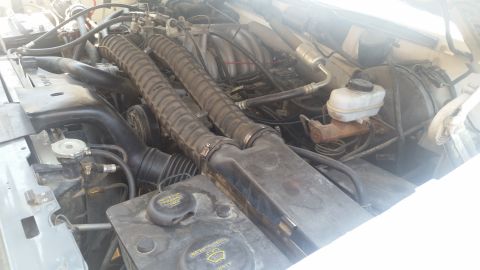 1992 Ford Bronco - Engine bay details showing the K&N Stage II Air Intake system with prominent dual hoses.