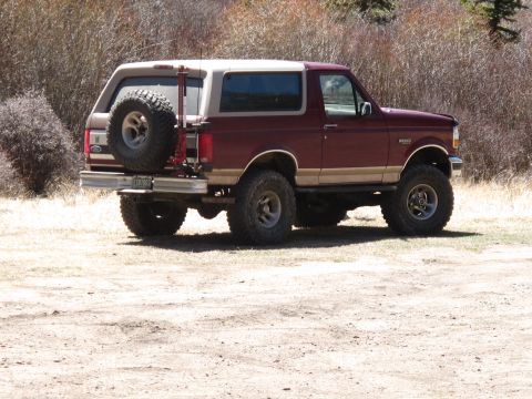 1996 Ford Bronco - This 1996 Ford Bronco is shown from the rear three-quarter view, parked outdoors.