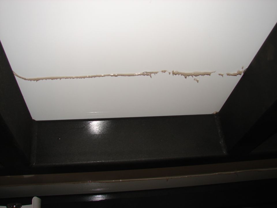 close-up of trailer frame with sealant