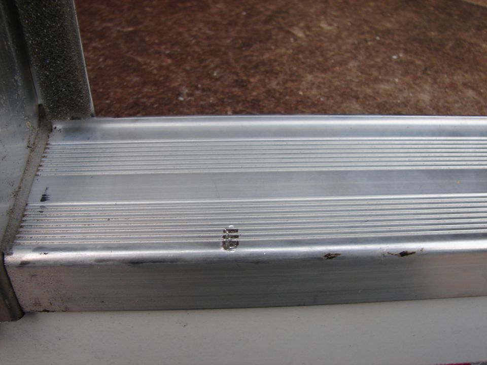 Living quarters door Is not mounted square to frame causing it to hang up on one of the door screws it is already already digging into sill plate.
