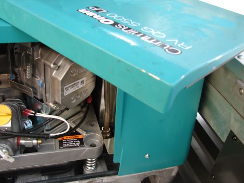 1973 Ford Ranchero - The generator has a warning label about hot surfaces and exhaust.