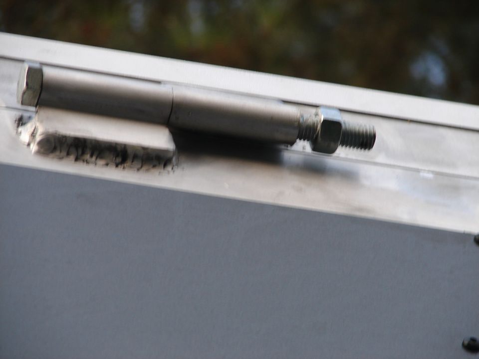 One of nuts for the hinges on hay box is already backing off the bolt. They should be double nutted or Nyloc style and then bolts could be a couple of inches shorter because you would not need the extra length for keep the nut from falling off