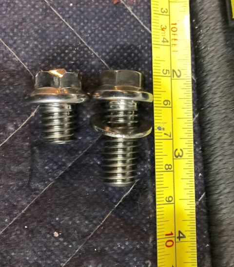 1978 Ford Bronco - Two bolts are shown next to a tape measure, indicating their size. The registry information for a 1978 Ford Bronco is likely incorrect.