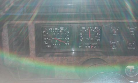 1986 Ford Bronco - The interior of a 1986 Ford Bronco shows a close-up of the dashboard gauges, including the speedometer, tachometer, fuel gauge, oil pressur…