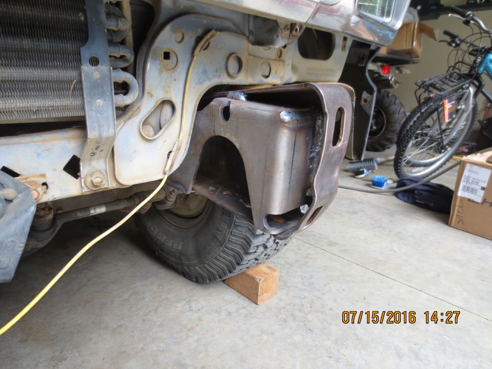 the welded part of SKY's shackle reversal. it pretty much slides into place, I had a harder time on the passenger side frame horn because it's been in a couple wrecks...