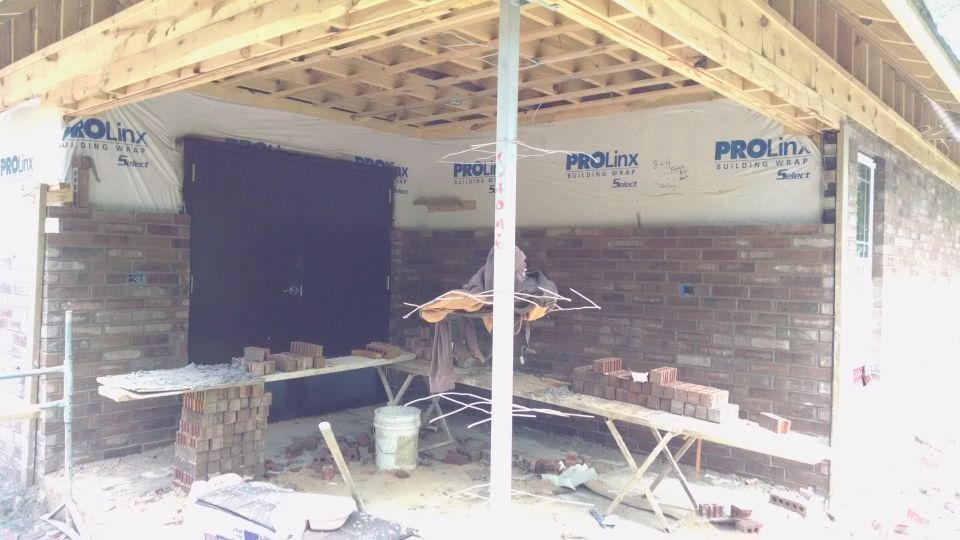 After a break yesterday, brick work continued today on the North side.