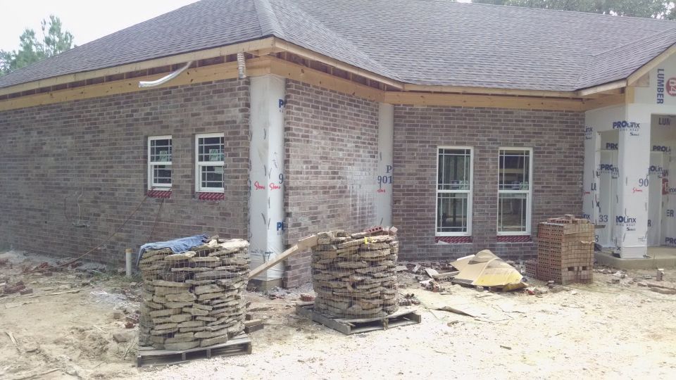 The master & office sides' (East of the front door) brick is done.