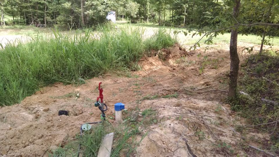 The well was connected to the house plumbing today, but the house wasn't pressurized yet.  The inside shutoff valve has to be moved, and an inspection passed.