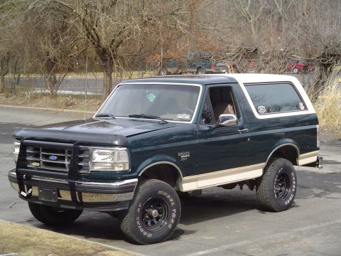 1993 Ford Bronco - This 1992 Ford Bronco is shown from a three-quarter front angle, a two-tone paint scheme and aftermarket front protection.