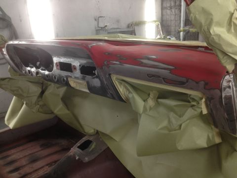 1964 Ford Fairlane - A partial view of a car's interior, with plants obscuring the view.