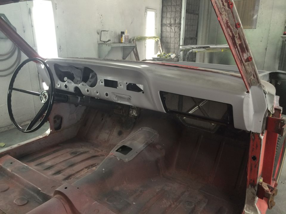 1964 Ford Fairlane interior, dashboard and steering wheel visible