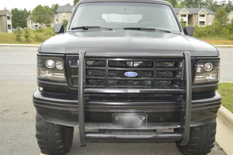 1992 Ford Bronco - Some sort of ebay ligjhts, with a brush guard grill.