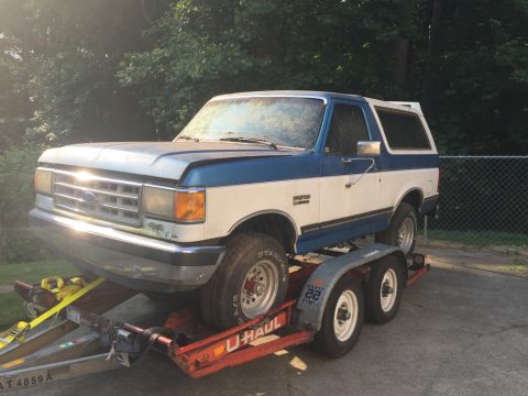 1989 Ford Bronco - when i first got her home. it was a tiring ride home because i had to load her on the trailer by myself with just a come-along. then i left…