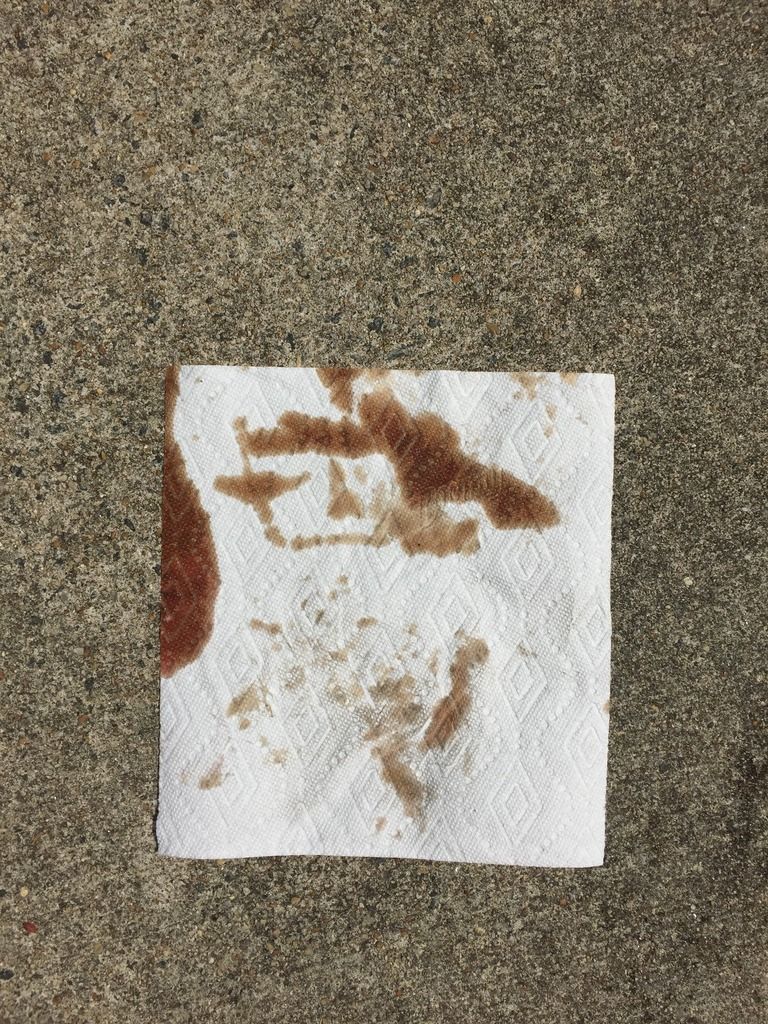 this is the fluid from the transfer case.  it looked more red when it was draining.  the reason i checked the fluid color is because the outside of the transfer case had brown leak stains and i suspected that a PO had put gear oil in the transfer case.  it should have 2 quarts of Mercon ATF for my BW 1356 case.  i dont remember the fluid smelling like gear oil, which i think i would have noticed, but the case's fill plug definately smelled like gear oil.  hopefully now that i changed the fluid and added 2 quarts of ATF the case will be properly lubricated.