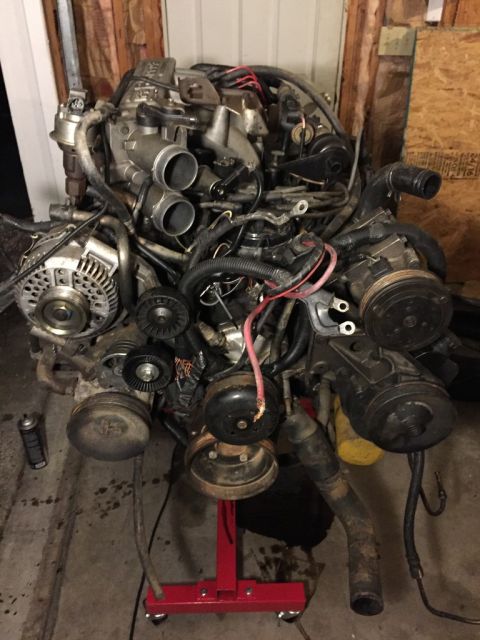 1989 Ford Bronco - the front of the engine. since it was from an e-van, note the saginaw pump. also, note the side mount 130A 3G alternator! they threw in all…