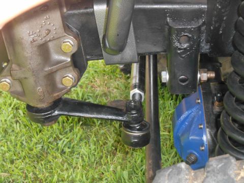1972 Ford Bronco - Undercarriage view shows steering linkage and suspension parts, with a prominent blue component.