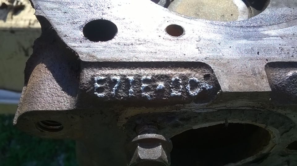 Cast iron Ford engine casting showing part number E7TE-10 stamped on the metal