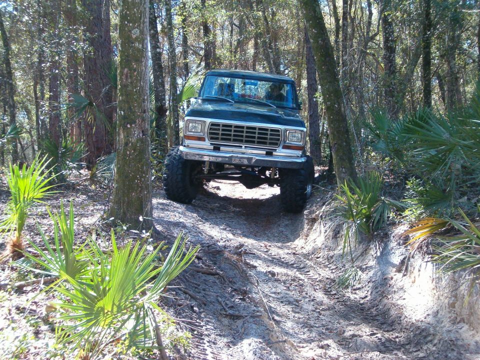 1979 Ford Bronco front view, dark color, off-roading