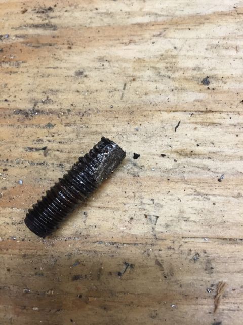 1989 Ford Bronco - this broken exhaust manifold bolt put up a good fight but after 20-30 minutes i was able to prevail. may he rust in pieces. this was the on…