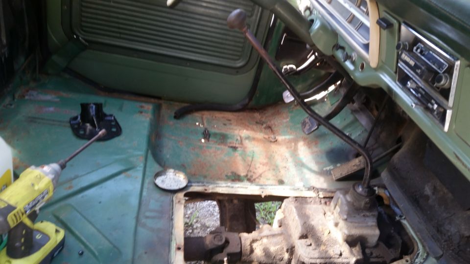 1978 Ford Bronco interior showing floor pan, transmission tunnel, and dashboard