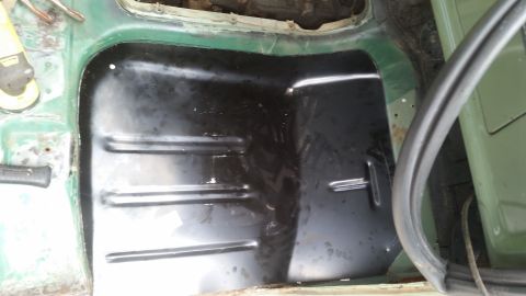 Interior floor pan of a green vehicle