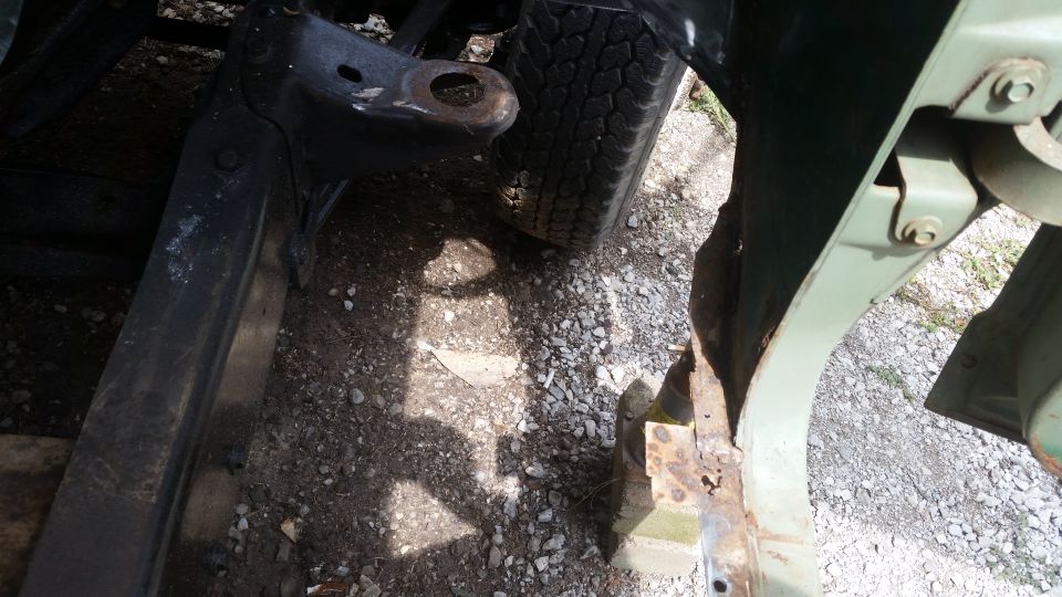 Vehicle frame and tire with rust damage