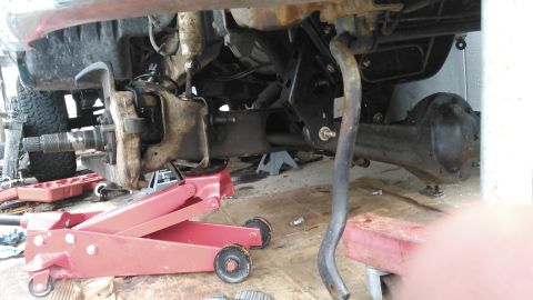 1996 Ford Bronco - got the old brackets removed. installed the 6 inch beam drop brackets installed and the axle beams hung with new Energy Suspension poly bus…