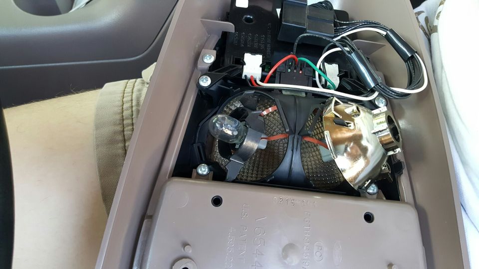 Interior light assembly with exposed bulb and wiring