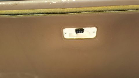 1996 Ford Bronco - Close-up of an interior overhead light switch with ON, OFF, and DOOR settings.