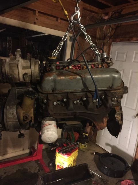 1989 Ford Bronco - the driver's side of the engine. ill be reusing the valve cover and the dipstick and tube on this side.