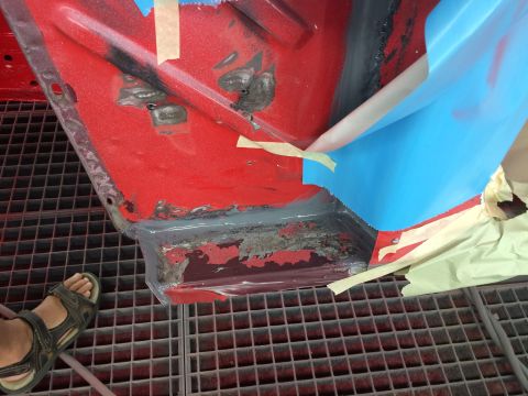 1964 Ford Fairlane - Car body panel being prepped for repair, showing rust and damage.