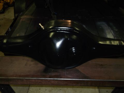 1967 Ford Mustang - A close-up view of a black rear differential assembly, likely undergoing restoration or repair.