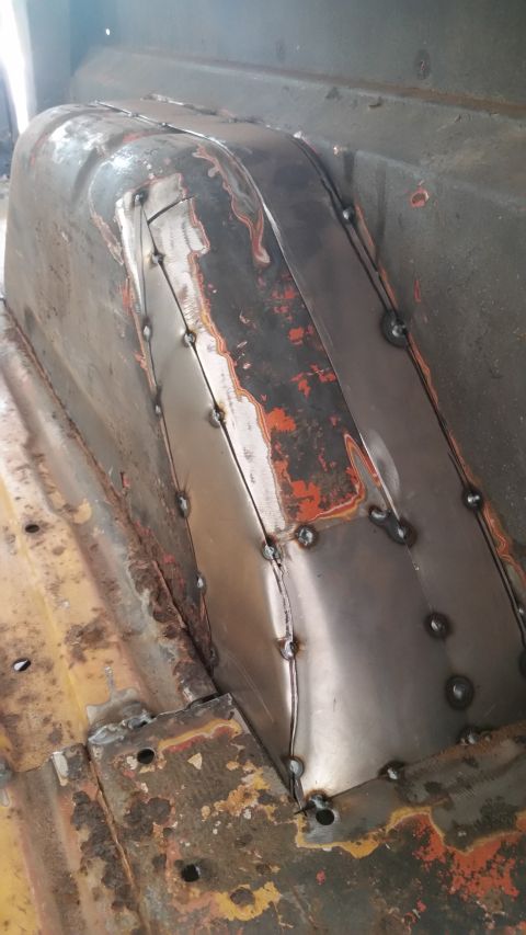 1979 Ford Bronco - This photo shows newly welded metal panels on the interior floor of a vehicle, indicating repairs have been made.