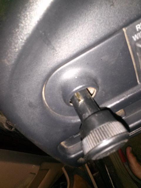 1996 Ford Bronco - Close-up view of a dashboard knob, likely for a climate control or accessory function.